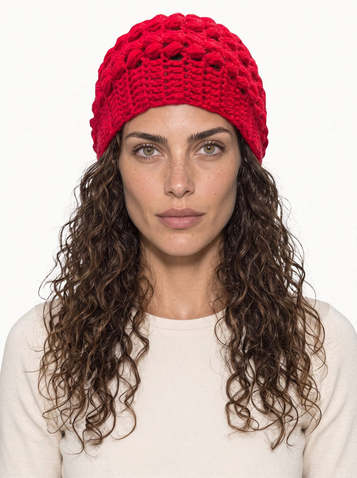 Koukla wearing the Little Red Toque, handmade crochet by KOUKLA
