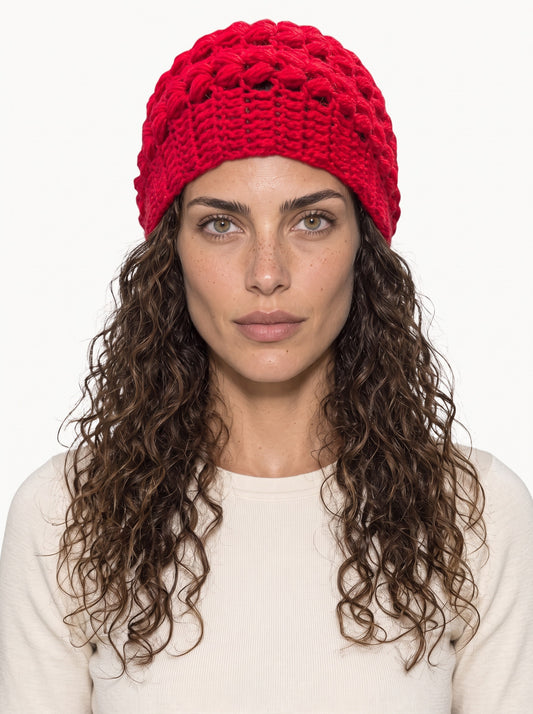 Koukla wearing the Little Red Toque, handmade crochet by KOUKLA