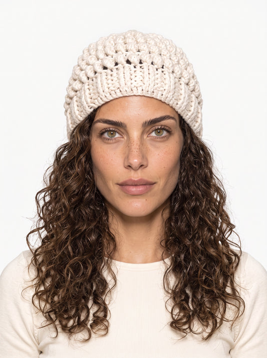 Koukla wearing the Creamsicle Toque, handmade crochet by KOUKLA