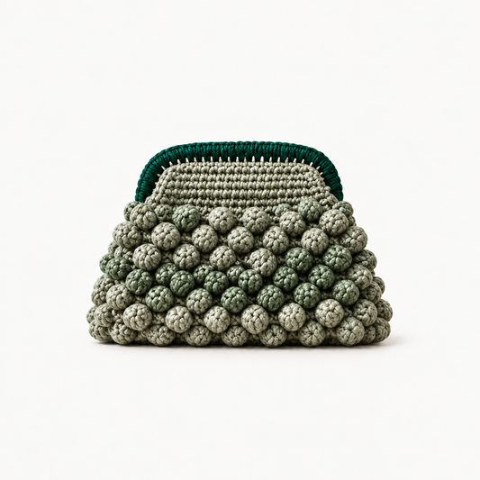 NAXOS OLIVE handmade crochet bobble clutch on off-white background